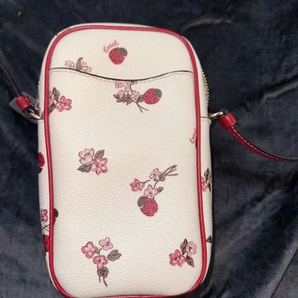 Coach Red and White Crossbody Bag with Adjustable Strap and Whimsical Design - Picture 3 of 5